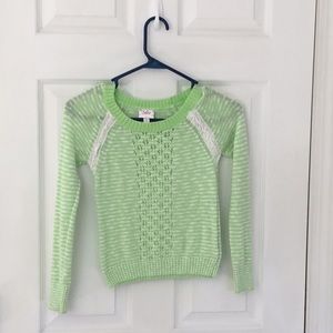 Bright green sweater!